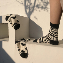 LET ME SEE black and white zebra pattern cow stripes color socks female ins tide middle barrel Joker Korean autumn and winter