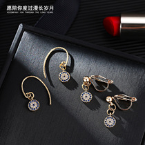 Devils eye design sense earrings female ear hanging niche ear clip French Net red earrings Korean temperament personality Wild