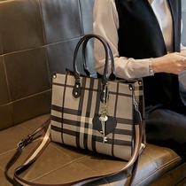 Hong Kong genuine leather girl bag 2021 new Korean version 100 lapped atmosphere plaid briefcase Totbag Hand single shoulder bag