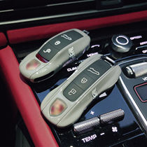 Porsche Kaws gray cartoon key shell buckle Cayenne macan911 Panamera 718Taycan