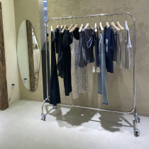 Clothing stores the bending stainless steel wheels Silver Island floor-mounted display rack womens clothing store shelf display