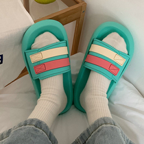 Korean version of ins couples vacation anti-skid step on excrement feeling beach shoes female summer fashion boys wear thick bottom deodorant slippers