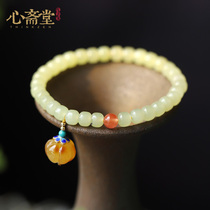 Xinzhaitang (heavy Xuan) natural Xinjiang yellow mouth material hand string Hetian Jade Buddha beads jewelry beeswax pumpkin bracelet female