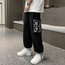 Pants mens autumn Tide brand ins stitching cashew fruit flower casual pants Hong Kong wind Ruffian handsome loose drawstring toe overalls