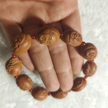 Putuo Mountain nuclear carving Luohan head Buddha beads can be used as car gear beads to ward off evil spirits and safety men hand-carved