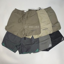 FOG Fear of God Essentials Nylon Laser Compound Shorts Shorts on High Street