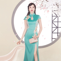 Jiangnan spring cheongsam 2021 new winter green embroidery young long high-end catwalk dress dance suit