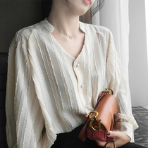  Hong Kong style shirt female ins tide design sense niche 2021 new Western style outer wear vertical stripes all-match solid color temperament