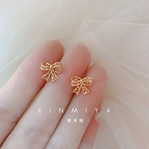 Simple and small French girl earring temperament S925 silver needle exquisite hollow lace bow ribbon earrings
