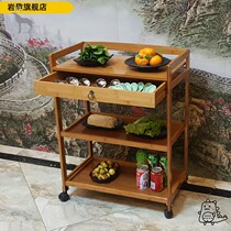 A small three-story tea shop with shelves at the table a hot pot shelf with shabu-shabu dishes a restaurant moisture-proof dish rack with wheels