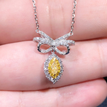 Yellow diamond necklace female 11-point horse eye yellow diamond pendant 18K gold inlaid 29 points diamond bow pendant