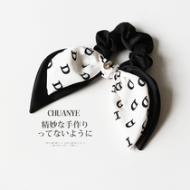 Kawano advanced sense letter bow Hairband Japanese and Korean temperament headwear Net Red New thick leather band female tie head rope