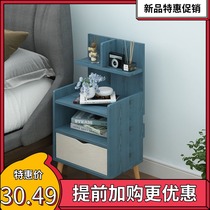  Simple modern bedside table Simple cloth drawer storage small cabinet locker Nordic bedroom small bedside cabinet