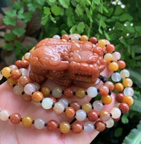 Yang Yujia Yunnan natural yellow dragon Jade Yin and Yang eyes sitting on the ground