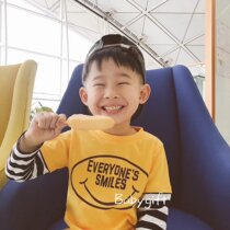 Spring and autumn new men and women small childrens clothing yellow Japanese Chaogang long sleeve cotton splicing fake two T-shirts