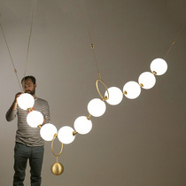 Post-modern light luxury stairwell clothing Nordic designer restaurant hotel lobby glass ball necklace creative chandelier