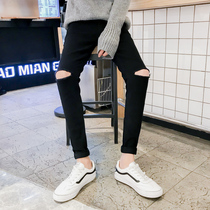 One-character hole black jeans mens slim body stretch Tide brand Korean version of the trend Joker small feet nine casual pants
