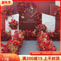 Wedding simulation floral stage welcome area T-table decoration red golden ground flower road guide flower point flower flower row Chinese style