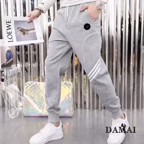 European station 2021 autumn and winter new casual pants mens slim feet feet sports pants closing elastic breathable pants