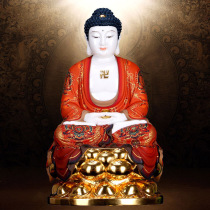 Stone carvings painted with gold Sakyamuni Buddha like the Pharmacist Buddha Amitabu Buddha statue of the Three Treasures Buddha home to the decoration of the pendulum