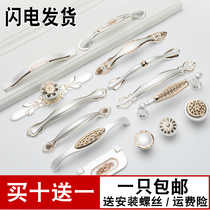 European-style gold and silver cabinet door Cabinet handle surface-mounted wardrobe door handle Modern simple cabinet drawer single hole hardware
