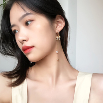 Korean fashion long bow earrings S925 silver pin senior sense French tassel earrings show face thin earrings women