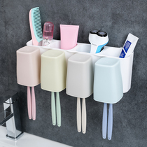 Suction Wall toothbrush holder wash set wall suction cup three or four mouthwash Cup squeeze toothpaste toilet rack