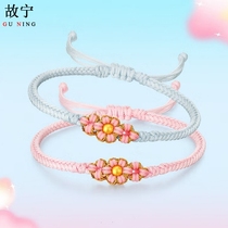 The new gold 999 braided hand rope small peach blossom bracelet pure gold zodiac year red rope hard gold hand decoration rabbit year gift