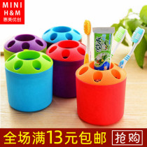 Multi-functional toothpaste toothbrush holder non-perforated vertical toilet toothbrush base creativity