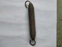 Vertical packaging machine tension spring