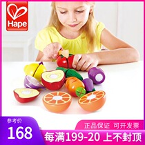 Hape wooden children in Germany to cut vegetables and fruits in kitchen wooden boys and girls