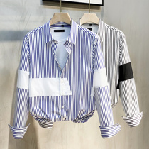 Mens vertical striped shirt long sleeve Korean version of stitching trend Korean version of advanced sense shirt handsome casual 2021 spring and autumn