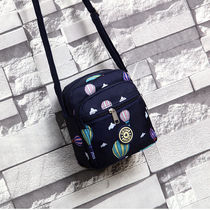 Bag female 2021 new vertical mobile phone bag messenger bag female wild bag on the street play small backpack coin purse