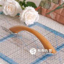 Wooden handle suction ruler