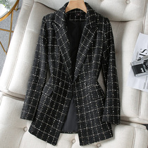 Black plaid little suit and blouse for women.
