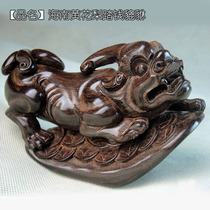 Mu Tan family Hainan Huanghua pear ornaments carved dynamic full tree core old oil pear stepping on money wood carving