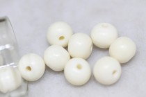 Tibetan Buddhist pearl accessories Tibetan beef bone apple round sepal bead pair hole with 0 85cm diameter of 1cm