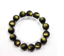 Manman natural double gold eye Gold Yao stone bracelet Cats eye Obsidian Gold Yao stone hand string men and women transport crystal jewelry
