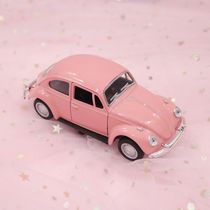 Pink Beetle car model car dashboard decoration girl heart desktop ornaments retro shooting background