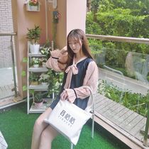 A Jun with the same hand-rolled piano bag 27512178449414