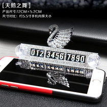 Car temporary parking number plate moving car phone placed on the car ornaments leave simple men and women