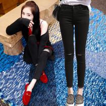 Hong Kong autumn clothing Yang Mi with small feet pants wool edge thin elastic hole Korean version of jeans women ankle-length pants