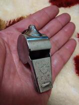 The torch is on the whistle.