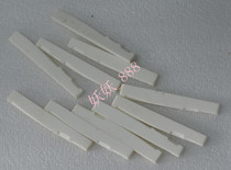 Folk guitar bridge bone meal production