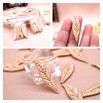 Champagne embroidery fabric small leaves flower cloth stickers DIY handmade jewelry clothing decoration accessories 12 1 yuan