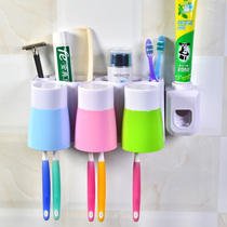 Creative wall-mounted suction cup toothbrush holder mouthwash cup suction wall-type automatic toothpaste squeezer with cup wash set hanger