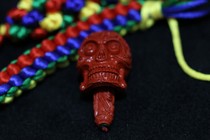 The main Buddha head of the original mine Cinnabar Seiko corpse tourlin is 2 4cm thick and the hole is 2 2cm and the total height is 3 6cm