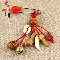 This years pendant bag hanging key chain baby evil evil baby shock pendant brooch black dog tooth pig bone