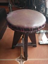  The old swivel chair in the early days of the founding of the Peoples Republic of China the old leather chair surface the cast iron shaft is high