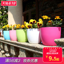 Candy color round plastic flower pot creative water-free water storage green plant potted lazy automatic absorbent flower pot